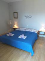 Postel nebo postele na pokoji v ubytování Apartments Vidic