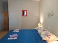 Postel nebo postele na pokoji v ubytování Apartments Vidic