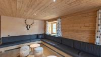 A seating area at alpen select lodge Kleinwalsertal