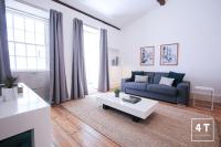 Posezení v ubytování Calacatta Housing