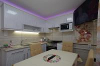 Kuchyňa alebo kuchynka v ubytovaní Amália Apartman