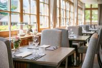 Posezení v ubytování TAUROA Seehotel Grundlsee