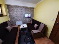 Televízia a/alebo spoločenská miestnosť v ubytovaní APARTAMENT ELIZABETH