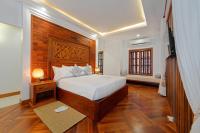 Cama o camas de una habitación en Angkor Privilege Resort & Spa