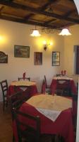 Reštaurácia alebo iné gastronomické zariadenie v ubytovaní Rifugio Del Pettirosso