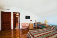 Televízia a/alebo spoločenská miestnosť v ubytovaní Villa Sveta Eufemija Bed end Breakfast I