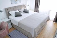 Postel nebo postele na pokoji v ubytování Apartment Villa Grga