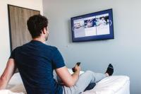 Televízia a/alebo spoločenská miestnosť v ubytovaní Hotel Rainers21