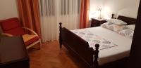 Postel nebo postele na pokoji v ubytování Apartman "Lara"
