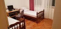 Postel nebo postele na pokoji v ubytování Apartman "Lara"