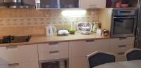 Kuchyň nebo kuchyňský kout v ubytování Apartman "Lara"