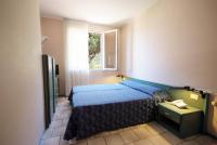Posteľ alebo postele v izbe v ubytovaní Hotel Residence Isola Verde
