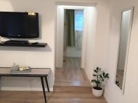 Telewizja i/lub zestaw kina domowego w obiekcie Piknik Apartmant