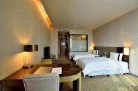 Shinkansen Grand Hotelにあるベッド