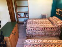 A bed or beds in a room at Torre Almadrava