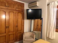A television and/or entertainment centre at Torre Almadrava