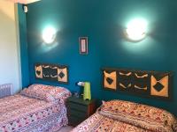 A bed or beds in a room at Torre Almadrava