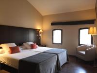 Postel nebo postele na pokoji v ubytování Molí Blanc Hotel