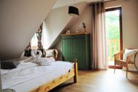 Łóżko lub łóżka w pokoju w obiekcie Apartamenty Homole Apartament D5