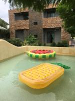 two infogie boards sitting on top of a swimming pool at Muho B&amp;B in Dongshan