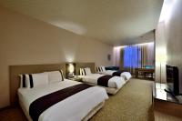 Shinkansen Grand Hotelにあるベッド