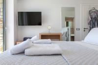Posteľ alebo postele v izbe v ubytovaní SIVOTA SUNSET VILLAS