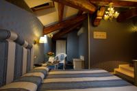 A bed or beds in a room at Hotel Conterie