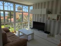 Posezení v ubytování Apartamento de lujo en La Toja