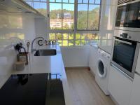 Kuchyň nebo kuchyňský kout v ubytování Apartamento de lujo en La Toja