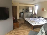 Postel nebo postele na pokoji v ubytování Apartmány Crystal Jasná