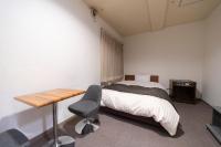 HOTEL CITY INN WAKAYAMA 和歌山駅前にあるベッド