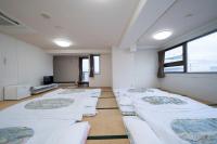 HOTEL CITY INN WAKAYAMA 和歌山駅前にあるベッド