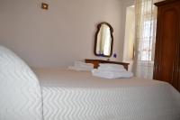 A bed or beds in a room at Casa Vacanze La Foggia