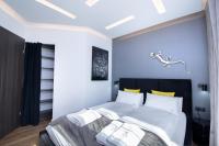 Posteľ alebo postele v izbe v ubytovaní Apartament Lagarto