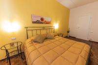 Posteľ alebo postele v izbe v ubytovaní Downtown Bologna Apartment