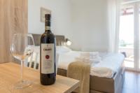 Postel nebo postele na pokoji v ubytování Villa Laura An