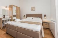 Postel nebo postele na pokoji v ubytování Villa Laura An