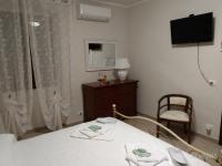 Posteľ alebo postele v izbe v ubytovaní Az. Agrituristica U'SPIGU