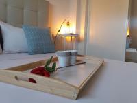 Łóżko lub łóżka w pokoju w obiekcie My Suites Madrid - Aeropuerto Ifema