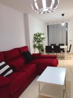 Posezení v ubytování Apartamentos Deluxe Roquetas de Mar con Golf y Piscina Climatizada, Parking privado