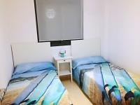Postel nebo postele na pokoji v ubytování Apartamentos Deluxe Roquetas de Mar con Golf y Piscina Climatizada, Parking privado