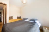 Postel nebo postele na pokoji v ubytování Jantar Apartamenty - Family Vacation Polanki