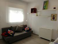 Część wypoczynkowa w obiekcie Apartamentos Playa Benitez
