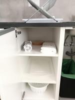 Łóżko lub łóżka piętrowe w pokoju w obiekcie Apartamentos Playa Benitez