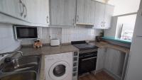 Kuchyň nebo kuchyňský kout v ubytování Apartament Núria