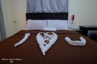 Postel nebo postele na pokoji v ubytování Horus Guest House Pyramids View