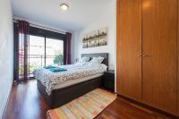 Postel nebo postele na pokoji v ubytování Jie Apartment