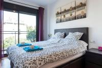 Postel nebo postele na pokoji v ubytování Jie Apartment