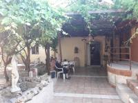 A patio or other outdoor area at VLASSIS APTS -ΜΕΛΙΔΟΝΙ-ΔΙΑΜΕΡΙΣΜΑ ΒΑΣΙΛΙΚΗ