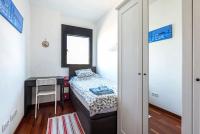 Postel nebo postele na pokoji v ubytování Jie Apartment